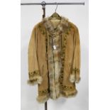 A circa 1960s embroidered suede jacket, lined with Deer fur,