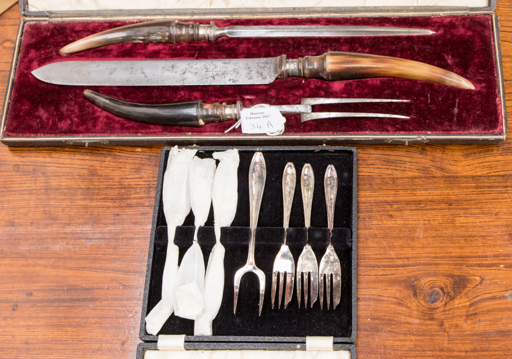 A 19th Century cased three piece carving set, steel blade, horn handles, Hobson & Sons,