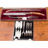 A 19th Century cased three piece carving set, steel blade, horn handles, Hobson & Sons,
