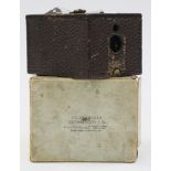 A leather bound pocket Kodak camera in original box, 96 Model latest patent listed,