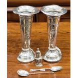 A pair of Edwardian silver trumpet vase, embossed floral swag decoration, loaded bases,