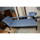 A late Victorian chaise lounge, upholstered in blue,