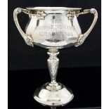 Golf Memorabilia: A three-handled golf trophy with engraving 'The George du Cros Challenge Cup',