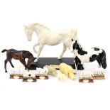 A collection of Beswick horses and other models,
