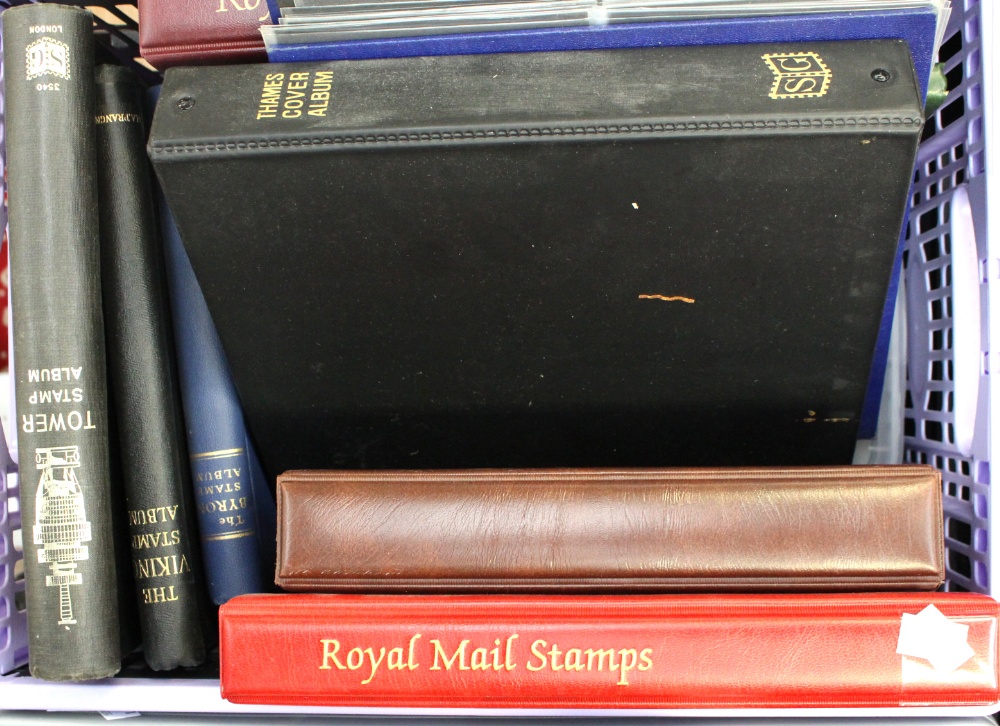 A large crate of stamps and empty album