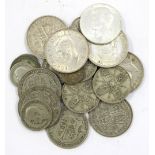 A collection of pre-1947 silver to include: a silver American half dollar, florins, half crowns,