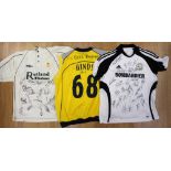 A collection of three signed shirts ,