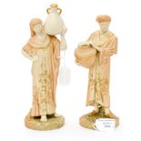 A pair of Royal Worcester blush ivory figures, miniature Cairo Water carriers, shape number 1250,