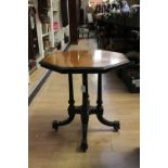 A Victorian octagonal occasional table, with walnut veneered top, 60cm high,