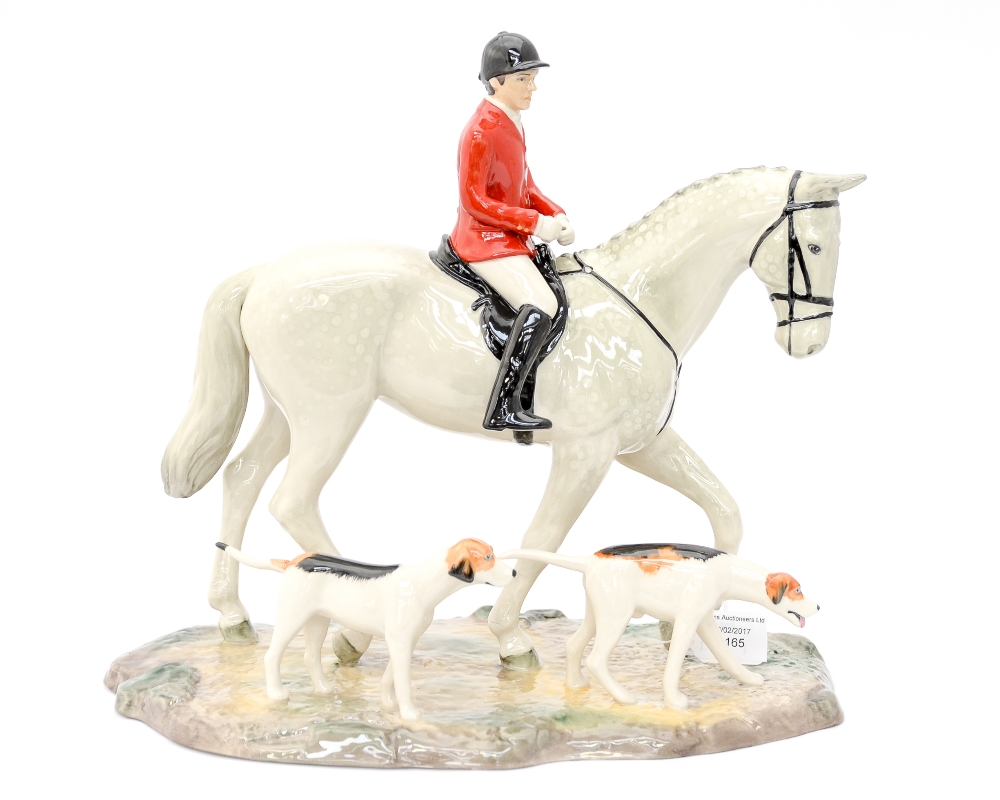 A Beswick limited edition 68/100 'The Hunt', man in hunting pink, on dappled grey hunter,