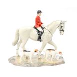 A Beswick limited edition 68/100 'The Hunt', man in hunting pink, on dappled grey hunter,