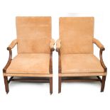 A pair of George III style mahogany open armchairs, in the manner of Thomas Chippendale,