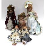 A collection of five various decorative display dolls to include: Les Baronnes 'Olympia Savio',