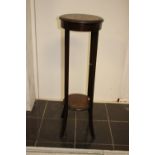 An early 20th Century oak lamp table,