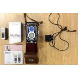 A German Rolleiflex camera Franke & Heidecke, synchro comparison lense, leather case,
