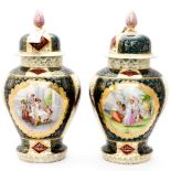 A pair of Viennese vases and covers