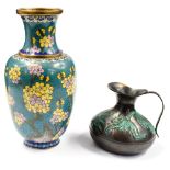 A Cloisonne vase with a bronzed jug having raised floral pattern