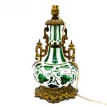 A Bohemian green and white table lamp,