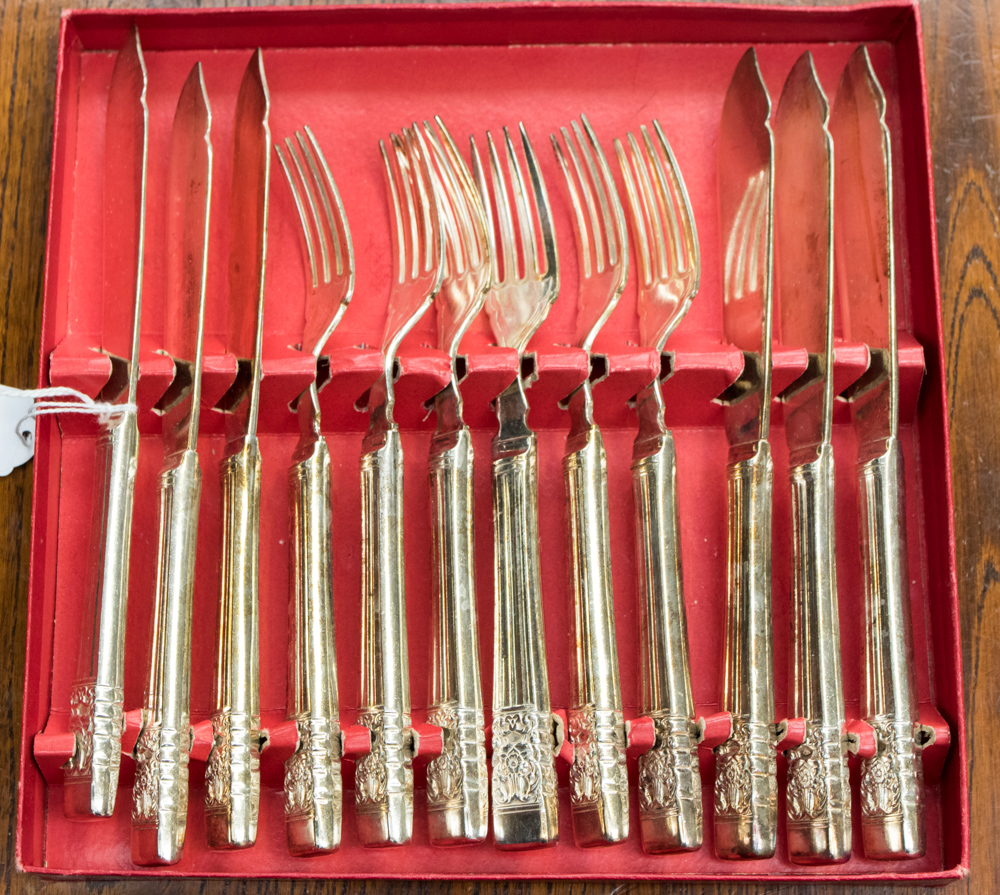A cased set of fish knives and forks,