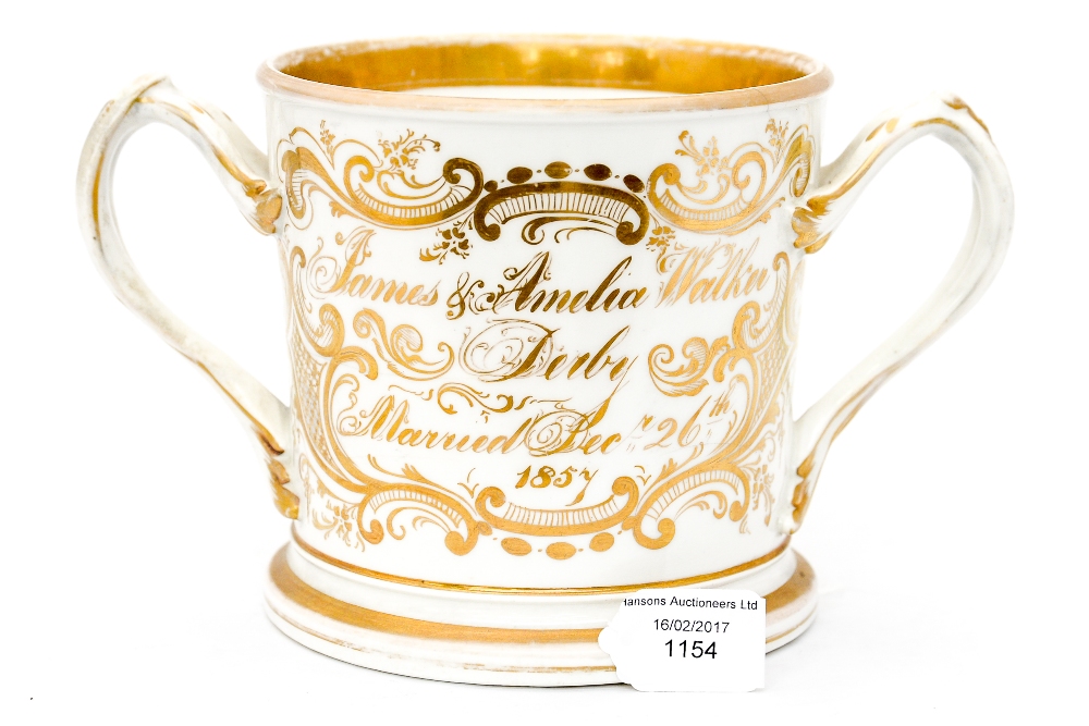 A loving cup, Staffordshire 1857, with a depiction of the marriage of James and Amelia Walker,