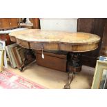 A mid Victorian walnut and burr veneered marquetry inlaid library table,