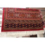 A red ground Bokhara carpet 2.