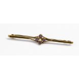 A 9ct gold seed pearl and amethyst bar brooch, length approximately 53mm,