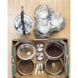 An EPNS three decanter holder, with three original cut glass decanters and stoppers,