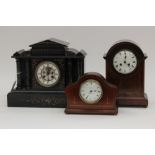 A marble mantle clock, white dial with black Roman numerals, gilt double chapter ring,