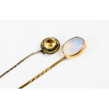 Yellow metal stick pin with citrine stone,