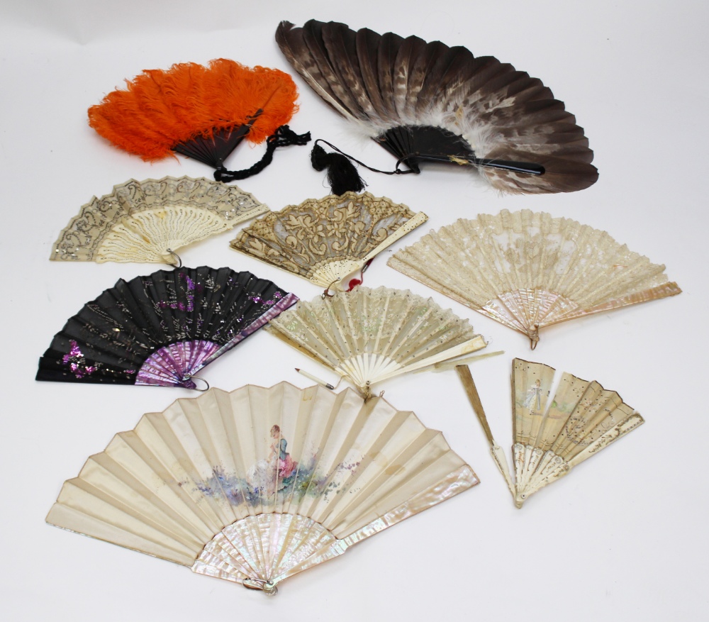 A collection of eight fans, Victorian and later, mother of pearl, ivory, lace and bead work,