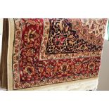 A Red ground Keshan Carpet 190cm x 140cm.