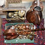 A box of brass and copper wares, including embossed coal box, converted brass oil lamps,