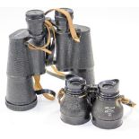 A pair of WW2 British field glasses in leather case marked "1944 J.B.B.
