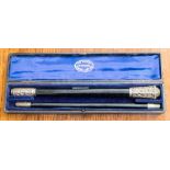 A Victorian 'Handy Pocket Baton', silver mounted presentation ebony baton, makers initials AJC,