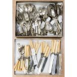 A large collection of assorted silver plated flatware, comprising knives, forks, spoons, teaspoons,