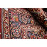 Red ground Persian mashad carpet,