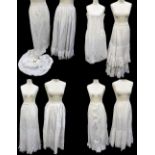 A collection of Victorian and Edwardian underskirts to include one heavily decorated in lace and