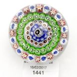 A Baccarat four ring concentric on clear paperweight,