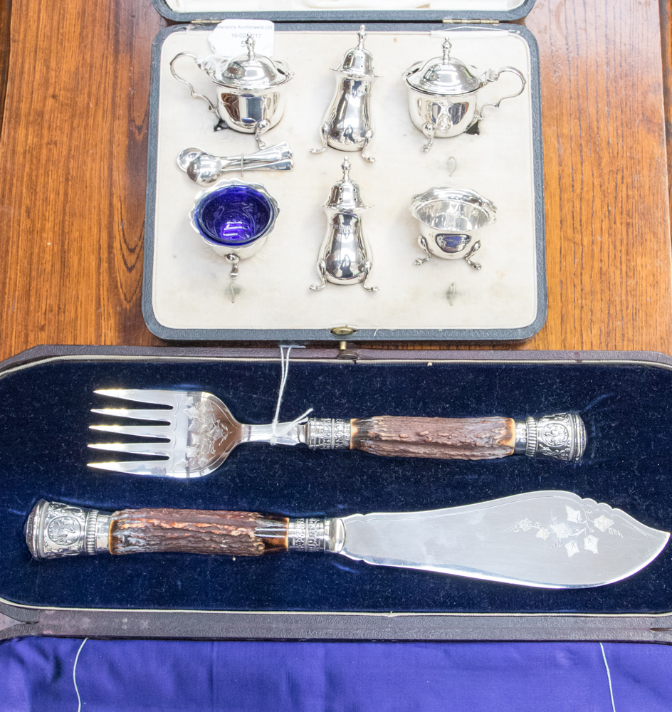 An early 20th century cased cruet set, Birmingham 1922, Mappin & Webb, spoons different makers,