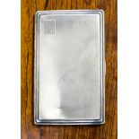 A George VI silver cigarette case, dented, engraved initials to cartouche, Smith and Bartlam,