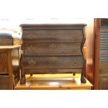 A Dutch style bombe oak chest of drawers,