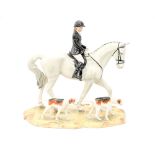 A Beswick limited edition 63/100 'The Hunt' woman in black hunting jacket,