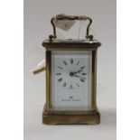 A Matthew Norman brass carriage clock (with key)