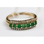 An emerald and diamond seven stone three row 9ct yellow gold ring, ring size O,