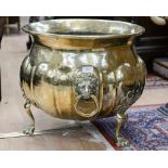 A large brass planter,