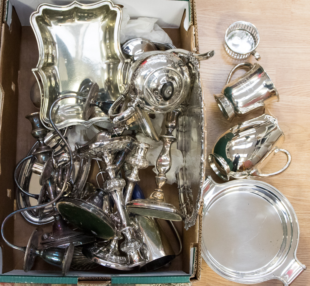 Silver plated items to include; meat fork, two pairs of candlesticks,