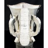 Golf Memorabilia: A four-handled silver golf trophy engraved 'The Louis M.