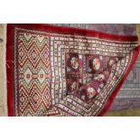 Large red ground Kashmir carpet with all over Bokhara design
