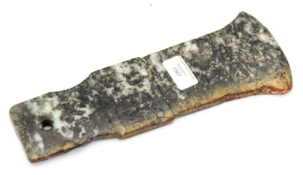 A Chinese jade axe head, carved with auspicious inscriptions,